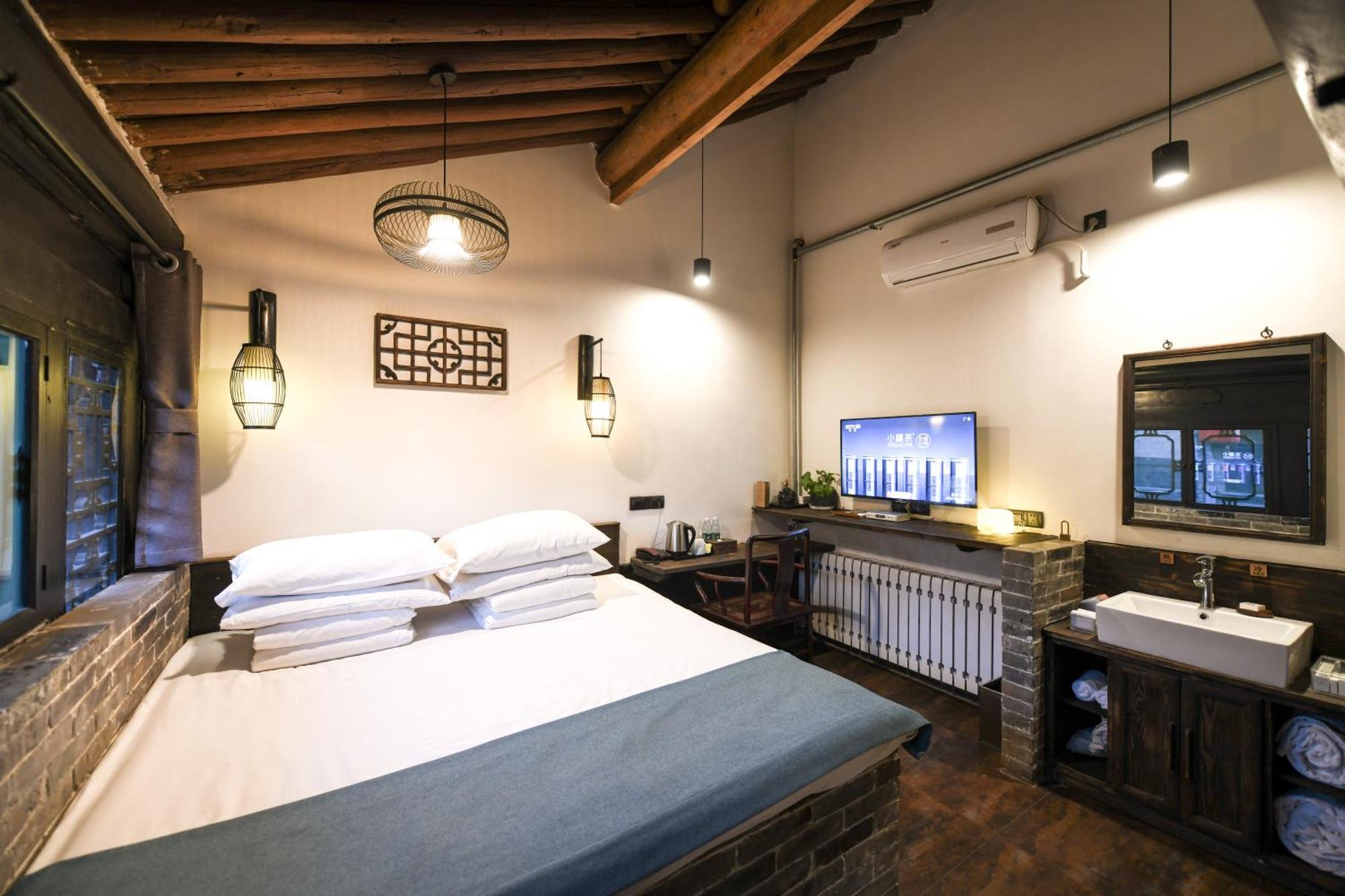 Elsewhere Hotel The Former Residence Of The Draft Bank Pingyao Eksteriør bilde