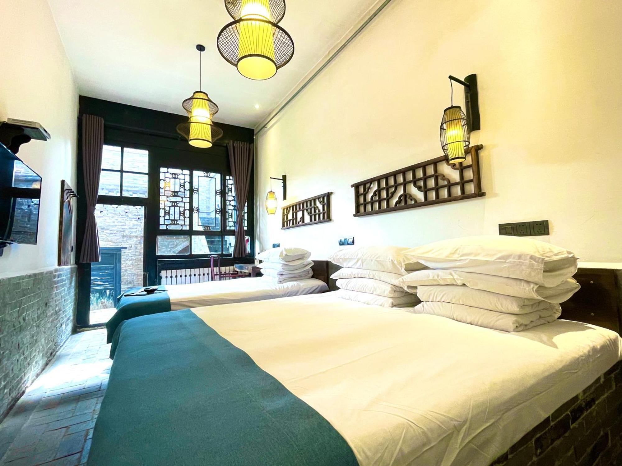 Elsewhere Hotel The Former Residence Of The Draft Bank Pingyao Eksteriør bilde